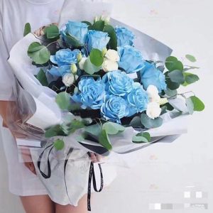 You are a treasure (10 icy blue roses, white lisianthus, eucalyptus) (imported roses)